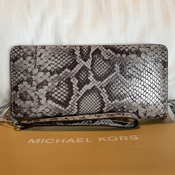 Michael Kors Handbags - ✨Michael Kors jet set large travel continental wallet embossed leather, NWT